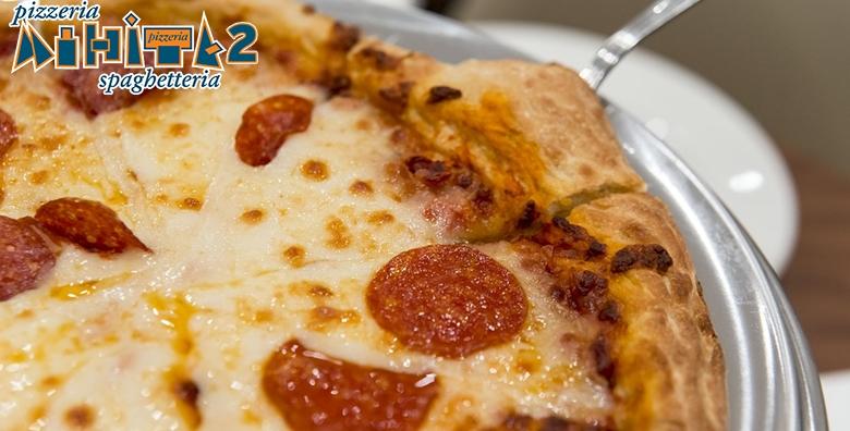 [2 VELIKE PIZZE] Hrskava korica, rastezljivi sir i sočni sos! Odaberi Margharitu, Capriciosu ili Vesuvio i uživaj u slasnim okusima Pizzerije Mihita već od 53 kn!